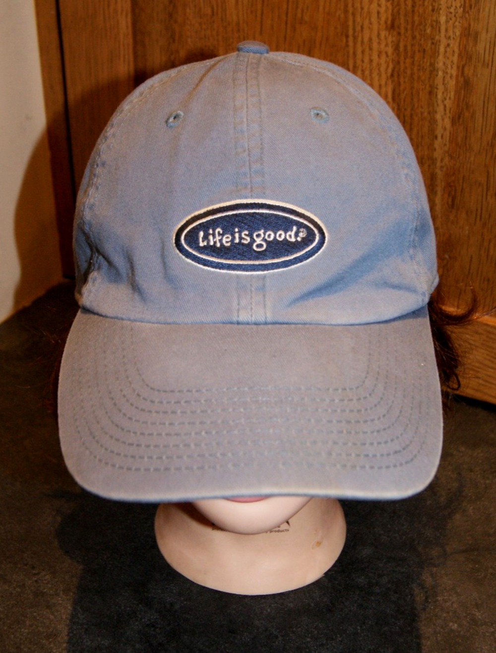 Life Is Good Light Blue Spell Out Oval Logo Casual Fit Strapback Hat Cap